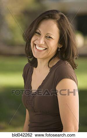 Hispanic woman laughing View Large Photo Image Stock Image - Hispanic woman laughing. Fotosearch