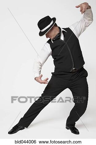 Stock Photograph - Man tango dancing. Fotosearch