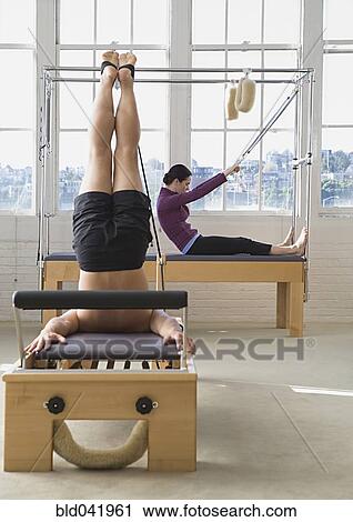 People stretching in exercise studio View Large Photo Image Stock Image - People stretching in exercise studio. Fotosearch