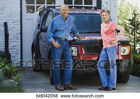 Senior African American couple polishing car View Large Photo Image Stock Photo - Senior African American couple polishing car. Fotosearch