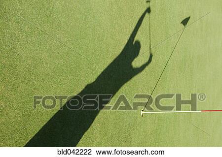 Shadow of man cheering on golf course View Large Photo Image Stock Image - Shadow of man cheering on golf course. Fotosearch
