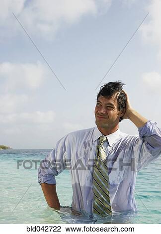 South American businessman in water View Large Photo Image Stock Image - South American businessman in water. Fotosearch