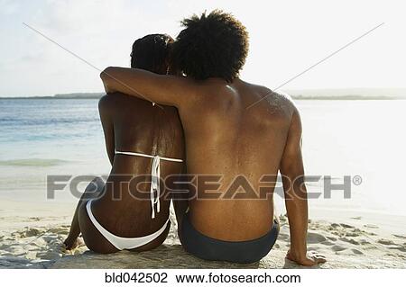 South American couple hugging at beach View Large Photo Image Stock Image - South American couple hugging at beach. Fotosearch