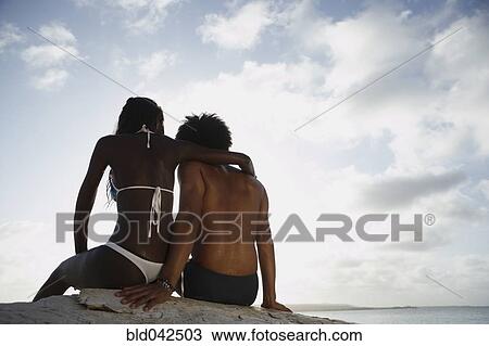 South American couple hugging at beach View Large Photo Image Stock Image - South American couple hugging at beach. Fotosearch