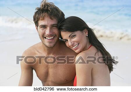 South American couple hugging on beach View Large Photo Image Stock Photograph - South American couple hugging on beach. Fotosearch