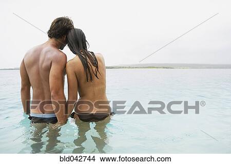 South American couple in water View Large Photo Image Picture - South American couple in water. Fotosearch