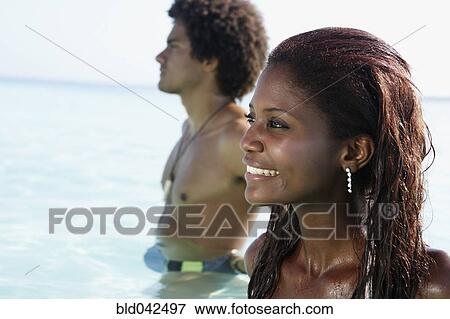 South American couple in water View Large Photo Image Stock Photo - South American couple in water. Fotosearch
