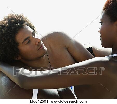 South American couple looking at each other View Large Photo Image Stock Image - South American couple looking at each other. Fotosearch