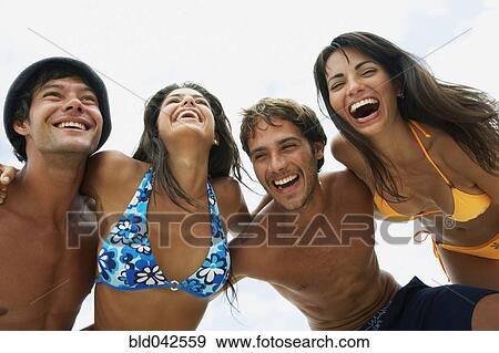 South American couples hugging View Large Photo Image Stock Photo - South American couples hugging. Fotosearch