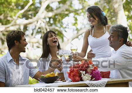 South American couples toasting with wine View Large Photo Image Stock Photo - South American couples toasting with wine. Fotosearch