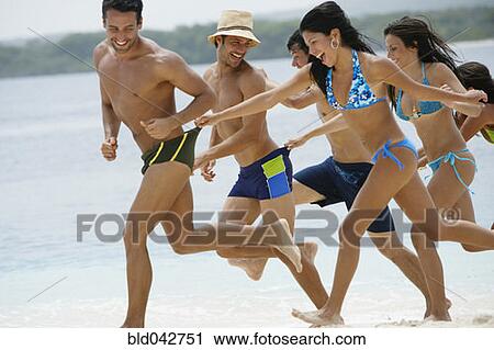 South American friends playing at beach View Large Photo Image Stock Image - South American friends playing at beach. Fotosearch
