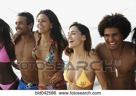 South American friends walking on beach View Large Photo Image Stock Photograph - South American friends walking on beach. Fotosearch