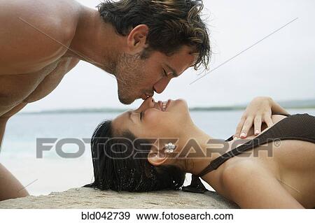 South American man kissing girlfriend on nose View Large Photo Image Stock Photo - South American man kissing girlfriend on nose. Fotosearch