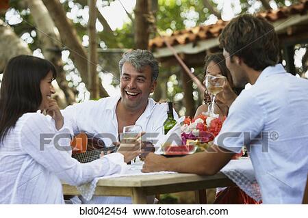 South American man playing guitar for friends View Large Photo Image Picture - South American man playing guitar for friends. Fotosearch