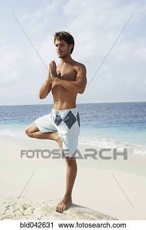 South American man practicing yoga View Large Photo Image Stock Image - South American man practicing yoga. Fotosearch
