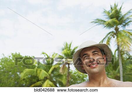 Stock Photo - South American man wearing hat. Fotosearch