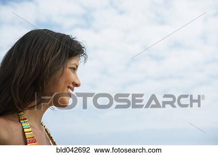 Stock Image - South American woman in bathing suit. Fotosearch