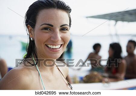 Stock Photography - South American woman in bathing suit. Fotosearch