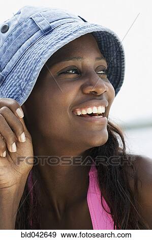 Stock Photo - South American woman wearing hat. Fotosearch
