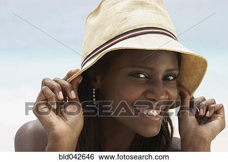 Stock Photograph - South American woman wearing hat. Fotosearch