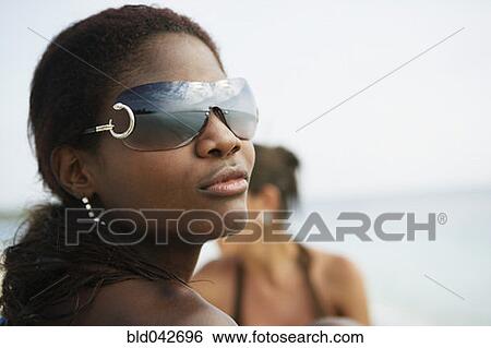South American woman wearing sunglasses View Large Photo Image Stock Photograph - South American woman wearing sunglasses. Fotosearch