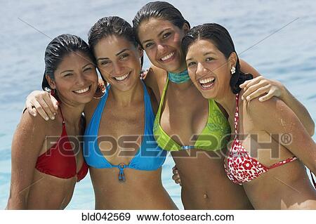 South American women hugging at beach View Large Photo Image Stock Photo - South American women hugging at beach. Fotosearch