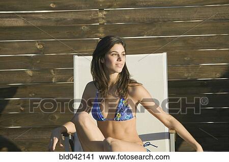 Young Hispanic woman wearing bathing suit View Large Photo Image Stock Image - Young Hispanic woman wearing bathing suit. Fotosearch