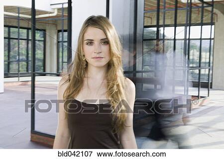 Young woman in empty house View Large Photo Image Stock Photo - Young woman in empty house. Fotosearch
