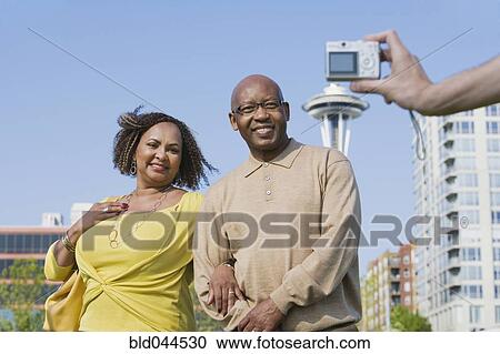 African American couple having photograph taken View Large Photo Image Stock Image - African American couple having photograph taken. Fotosearch