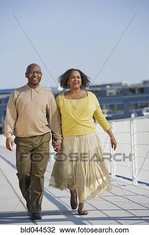 African American couple holding hands View Large Photo Image Stock Image - African American couple holding hands. Fotosearch