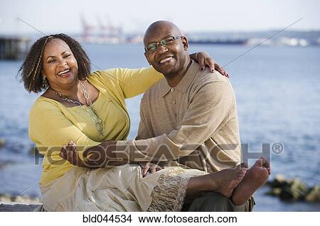 African American couple hugging View Large Photo Image Picture - African American couple hugging. Fotosearch