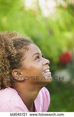 African American girl looking up View Large Photo Image Stock Image - African American girl looking up. Fotosearch