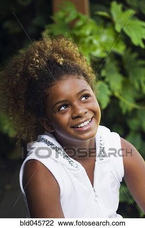 African American girl looking up View Large Photo Image Stock Image - African American girl looking up. Fotosearch