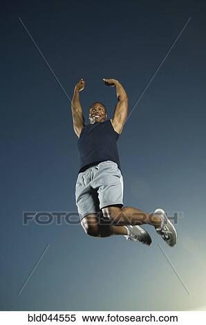 African American man jumping View Large Photo Image Stock Photography - African American man jumping. Fotosearch