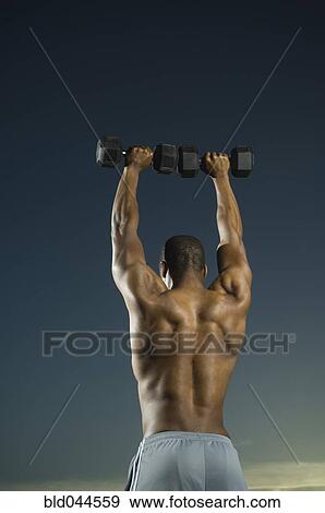 African American man lifting weights View Large Photo Image Stock Photo - African American man lifting weights. Fotosearch
