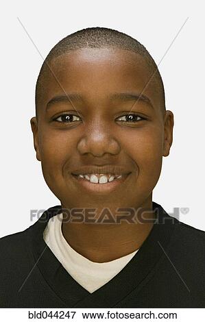 Stock Photo - Close up of African American boy smiling. Fotosearch