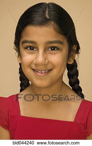 Close up of Hispanic girl smiling View Large Photo Image Stock Image - Close up of Hispanic girl smiling. Fotosearch