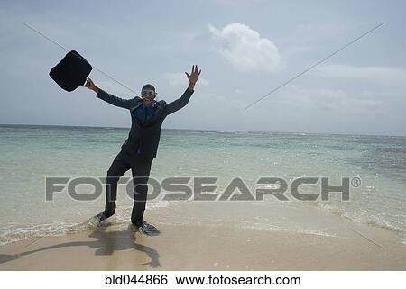 Hispanic businessman wearing snorkeling gear View Large Photo Image Stock Photograph - Hispanic businessman wearing snorkeling gear. Fotosearch