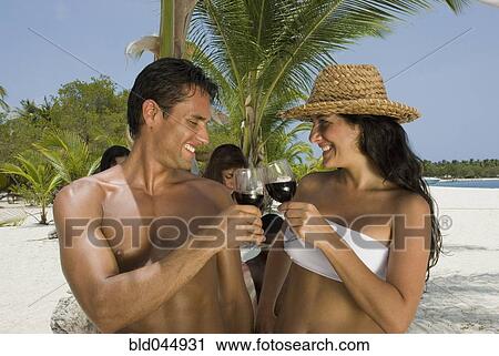 Hispanic couple at beach View Large Photo Image Stock Image - Hispanic couple at beach. Fotosearch