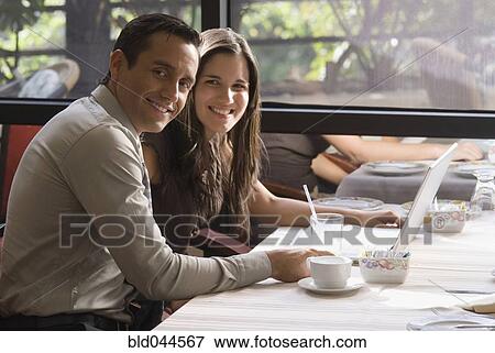 Hispanic couple at restaurant View Large Photo Image Stock Photo - Hispanic couple at restaurant. Fotosearch