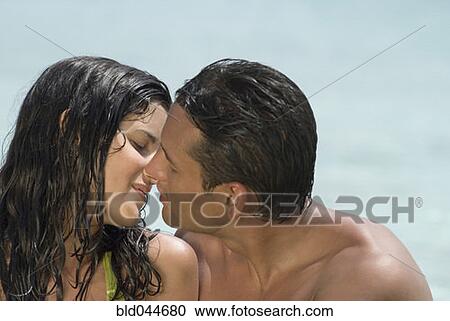 Hispanic couple kissing View Large Photo Image Stock Image - Hispanic couple kissing. Fotosearch