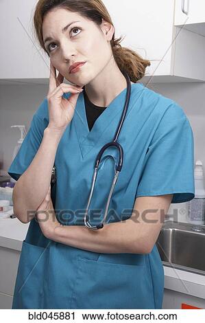 Hispanic female medical professional thinking View Large Photo Image Stock Image - Hispanic female medical professional thinking. Fotosearch