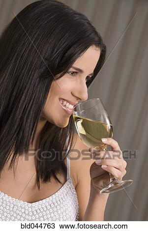 Hispanic woman drinking wine View Large Photo Image Stock Image - Hispanic woman drinking wine. Fotosearch