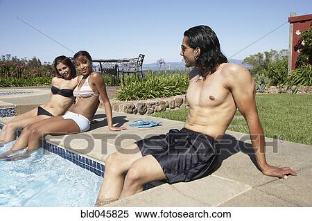 Indian man looking at multi-ethnic women View Large Photo Image Stock Photography - Indian man looking at multi-ethnic women. Fotosearch