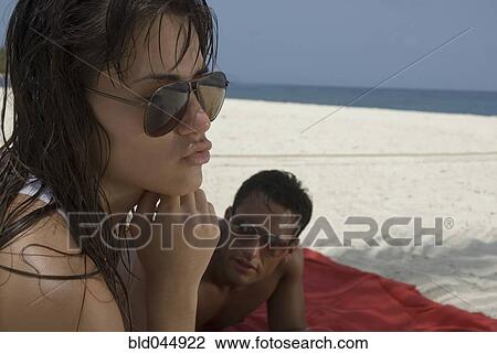 Multi-ethnic couple at beach View Large Photo Image Stock Image - Multi-ethnic couple at beach. Fotosearch