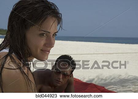 Multi-ethnic couple at beach View Large Photo Image Stock Image - Multi-ethnic couple at beach. Fotosearch