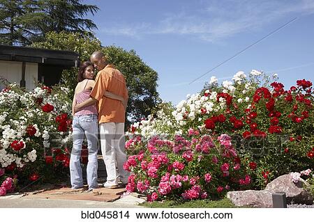 Picture - Multi-ethnic couple hugging. Fotosearch