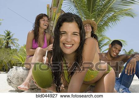 Multi-ethnic friends at beach View Large Photo Image Stock Photo - Multi-ethnic friends at beach. Fotosearch