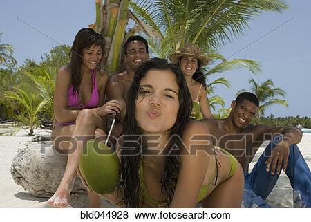Multi-ethnic friends at beach View Large Photo Image Stock Photo - Multi-ethnic friends at beach. Fotosearch