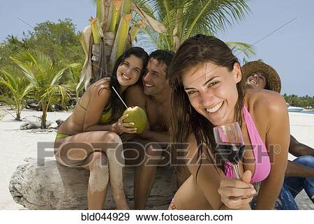 Multi-ethnic friends at beach View Large Photo Image Stock Photo - Multi-ethnic friends at beach. Fotosearch